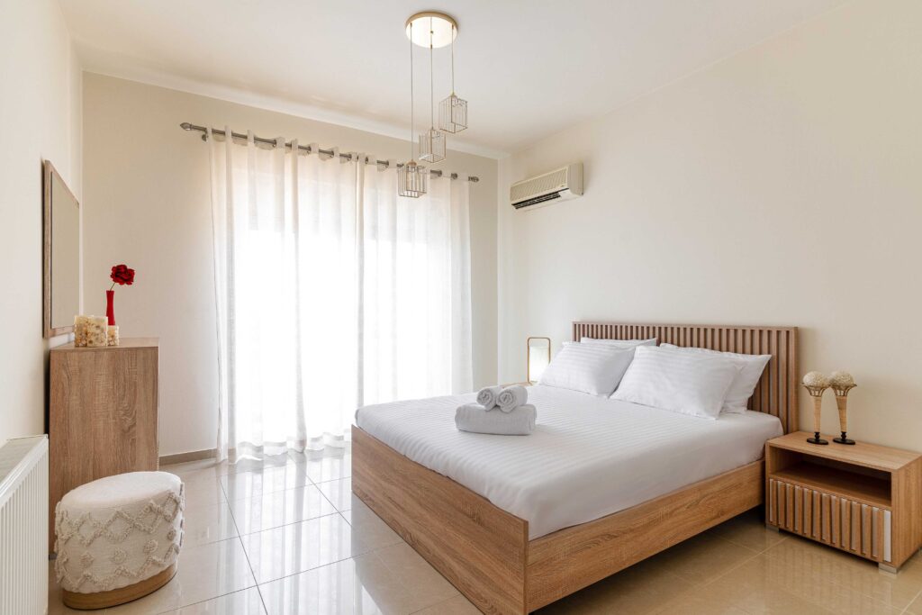 Elegant and cozy bedroom at Mira Elite Villa Accomodation, designed for luxury and relaxation.